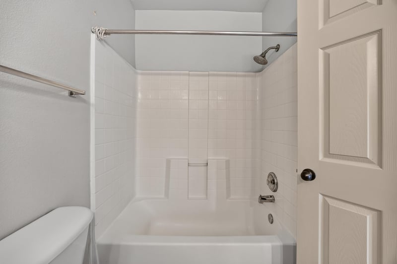 Bathroom shower with tile walls at 342 E Ashley St, Jacksonville, FL 32202