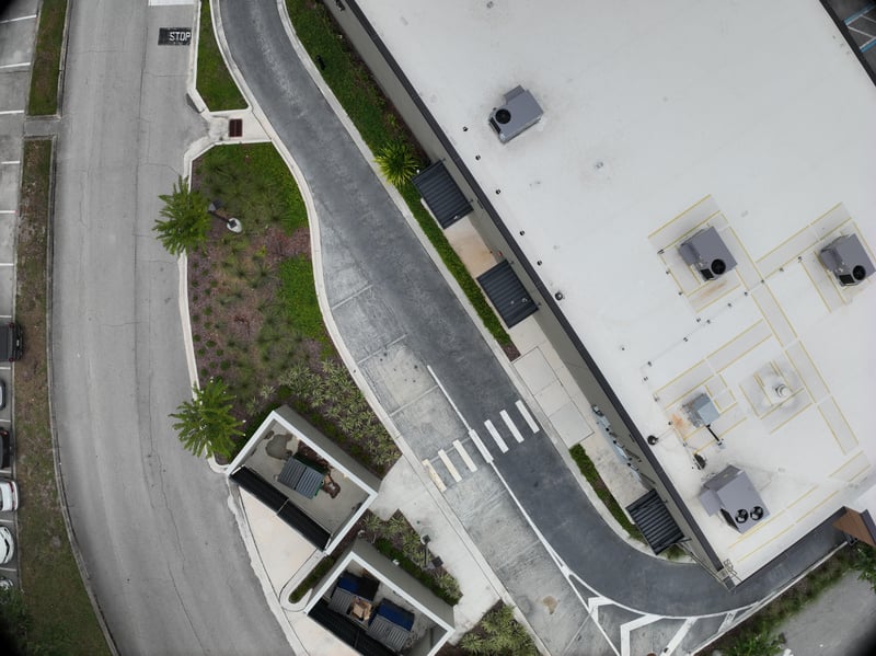 Aerial view of drive and landscaped bed at 9406 Atlantic Blvd, Jacksonville, FL 32225