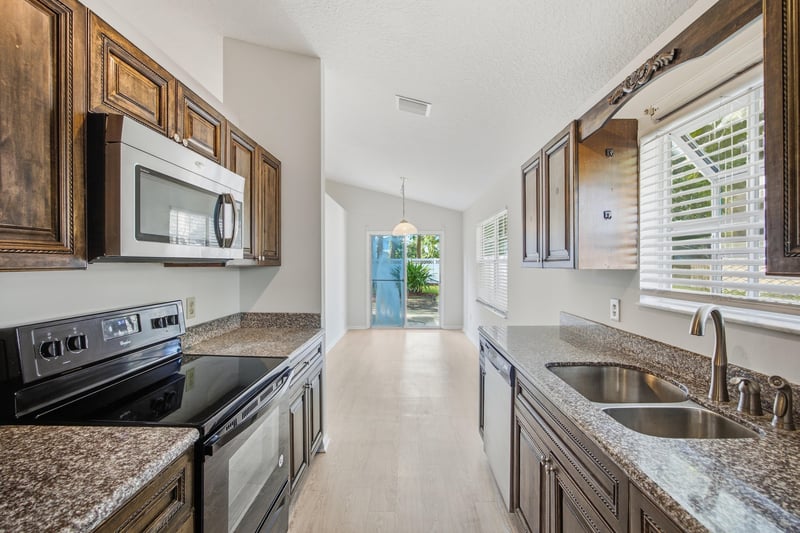 Kitchen view toward hallway at 678 5th Ave N, Jacksonville Beach, FL 32250