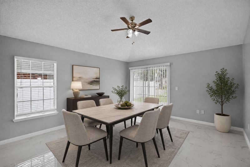 Staged dining area with table and window at 490 Hillside Dr, Orange Park, FL 32073