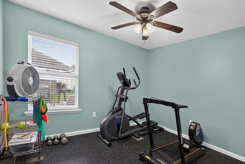 Room used as home gym with elliptical and treadmill at 3112 Silverado Cir, Green Cove Springs, FL 32043