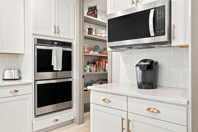 Kitchen wall ovens and built-in microwave at 3921 Spyglass Hill Ln