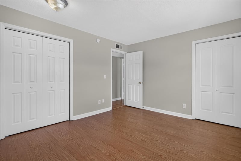 Bedroom with closet doors at 3866 Campenero Ct unit 6, Jacksonville, FL 32217
