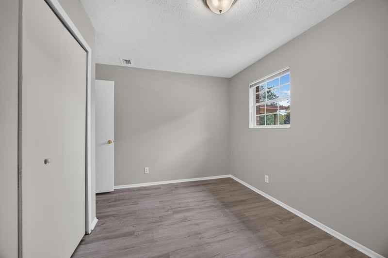 Empty room with window and closet at 1083 Stokes St, Jacksonville, FL