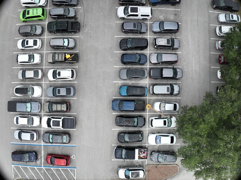Aerial view of parking lot and tree island at 9406 Atlantic Blvd, Jacksonville, FL 32225