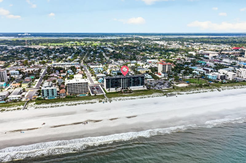 Aerial view of the coastline near the building in Jacksonville Beach