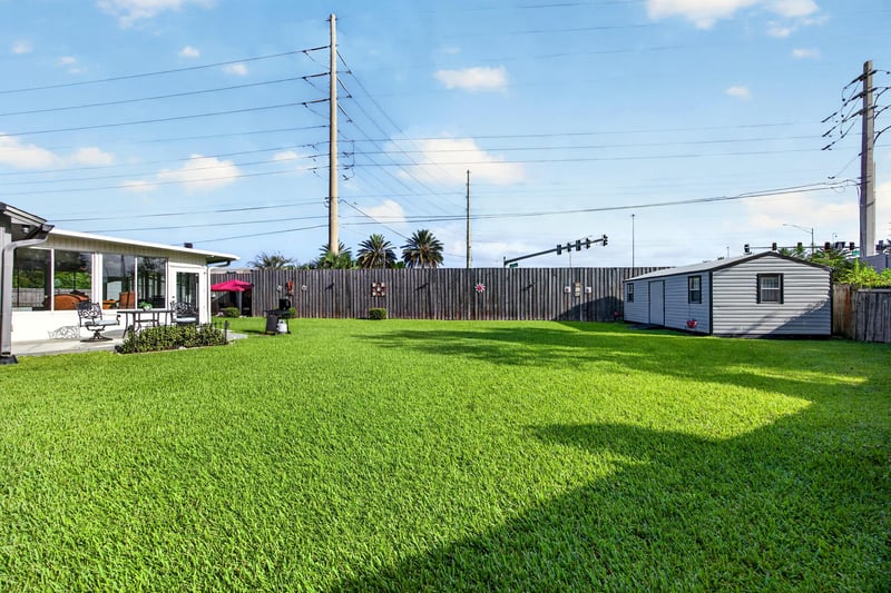 Backyard open lawn at 6931 Cane Grass Ln E, Jacksonville, FL 32244