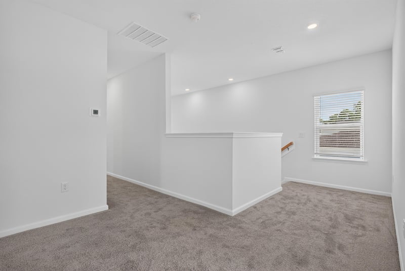 Upstairs landing with half wall at 269 Bluegrass Wy, St. Augustine, FL 32092