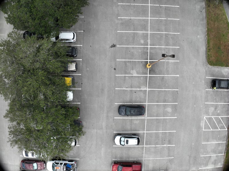 Aerial view of parking lot and tree canopy at 9406 Atlantic Blvd, Jacksonville, FL 32225