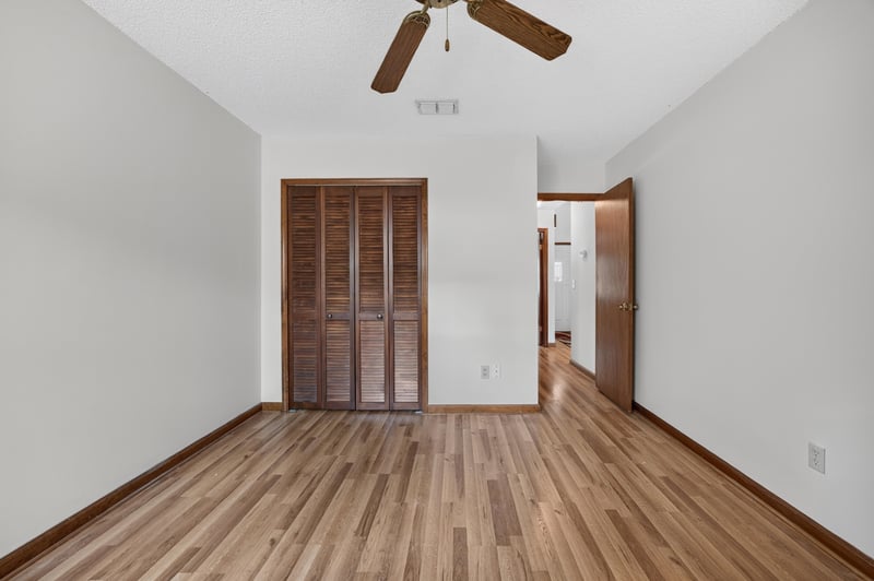 Empty room with closet and hallway view at 2460 San Sago Ln, Jacksonville, FL