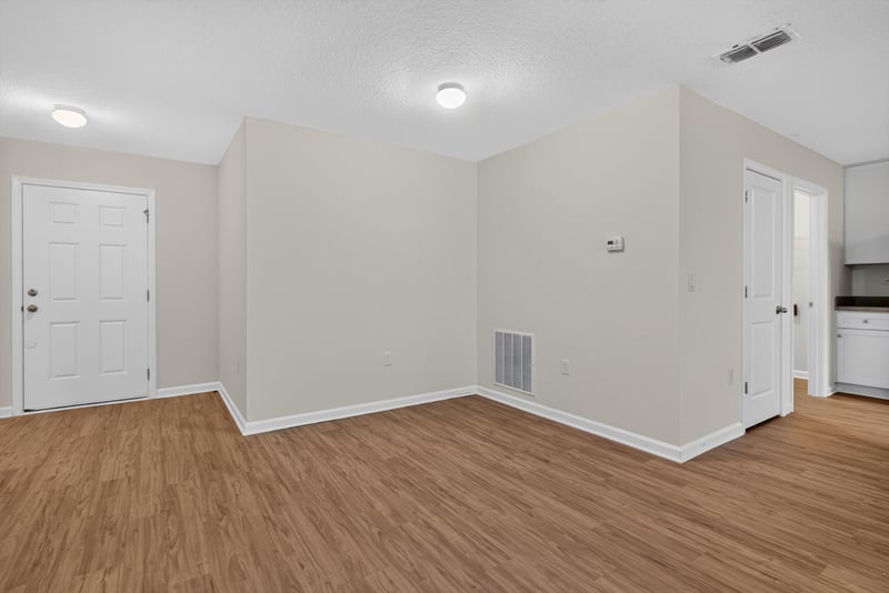 Hallway with closet doors at 95221 Siena Ct, Fernandina Beach, FL 32034