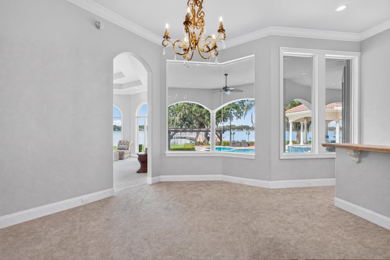 Primary bedroom balcony view of pool and lake at 344 Broward Rd, Jacksonville, FL