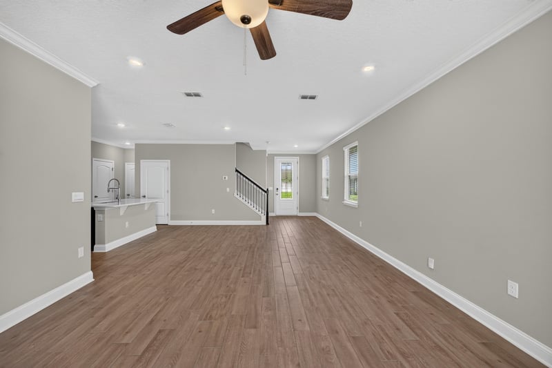 Living area with wood-look flooring at 331 Millerstone Dr, St. Augustine, FL 32092
