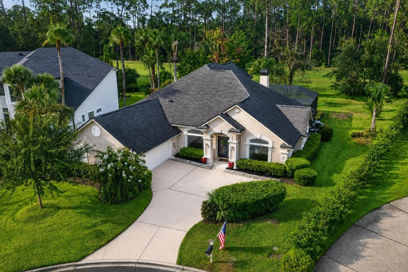 Aerial view of the home's roofline and lot at 2304 Spring Hill Ct, Orange Park, FL