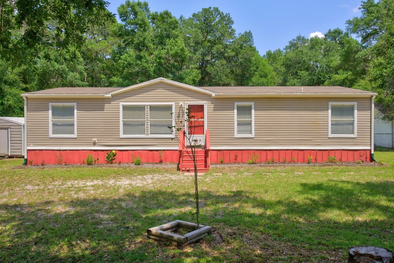 Front exterior day view of the home at 2549 Snapdragon Ave, Middleburg, FL 32068