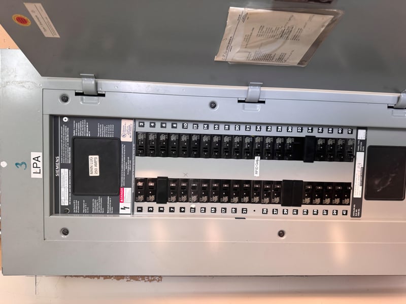Open panel labeled LPA with breakers at 11700 New Kings Rd, Jacksonville, FL 32219