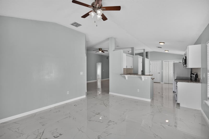 Open floor plan view from living area toward kitchen at 490 Hillside Dr, Orange Park, FL 32073