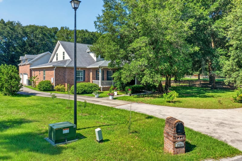 Brick front exterior with mature trees at 1735 Hagans Ridge Ct