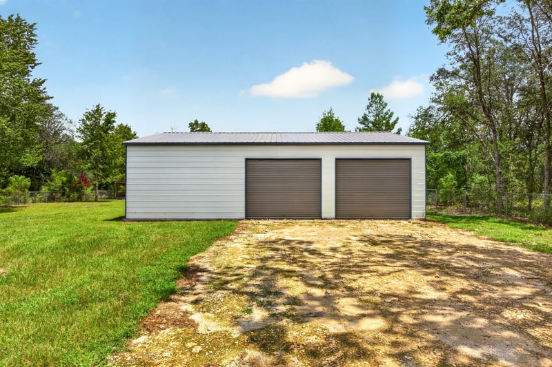 Two-car detached metal garage at 6757 Deer Springs Rd, Keystone Heights, FL 32656