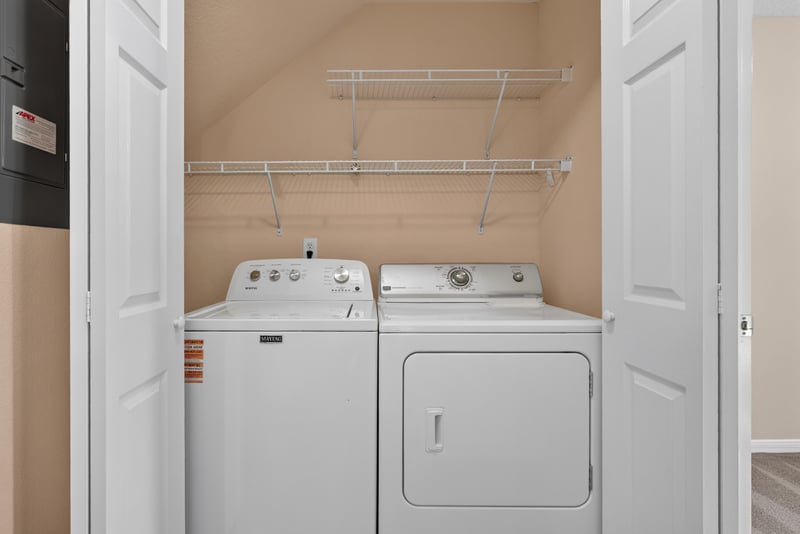 Laundry closet with washer and dryer at 353 Redwood Ln