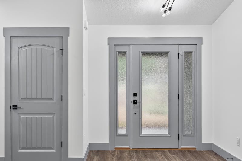 Entry foyer with double glass front doors at 4800 Acacia St, Middleburg, FL 32068
