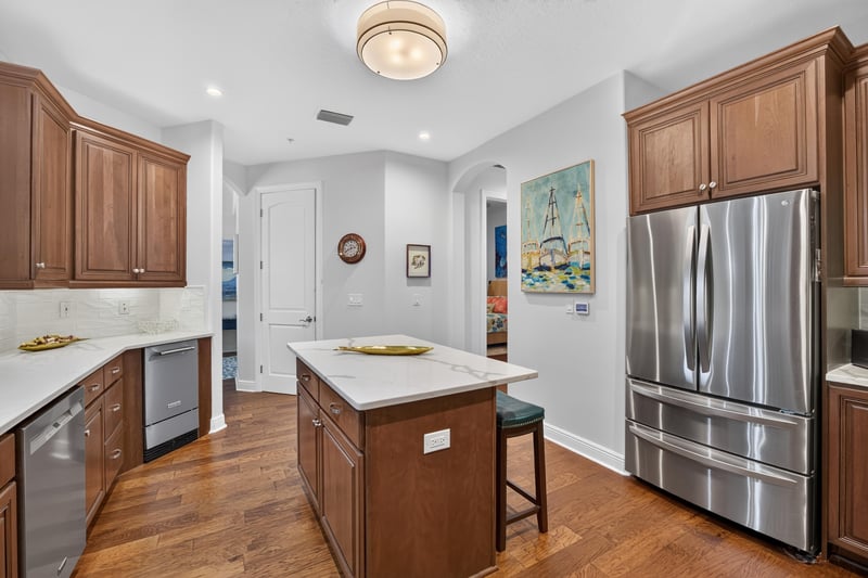 Kitchen with stainless appliances and quartz island at 140 Ave De La Mer, Palm Coast, FL 32137
