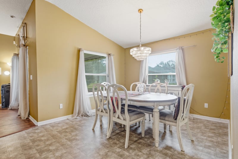 Dining area with round table and chairs at 7392 Timber Falls Ct