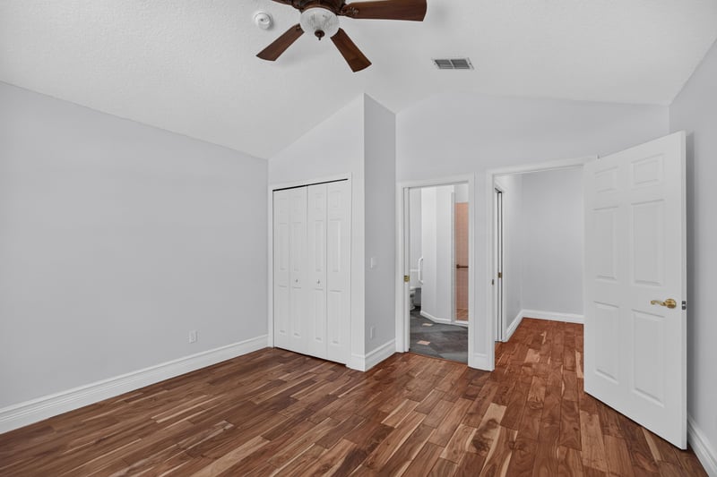 Bedroom panorama with closet doors at 11675 Magnolia Estates Rd, Jacksonville, FL 32223