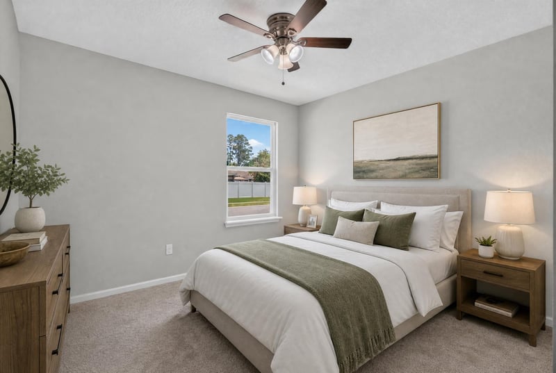 Bedroom with ceiling fan and window at 10066 Andean Fox Dr, Jacksonville, FL 32222