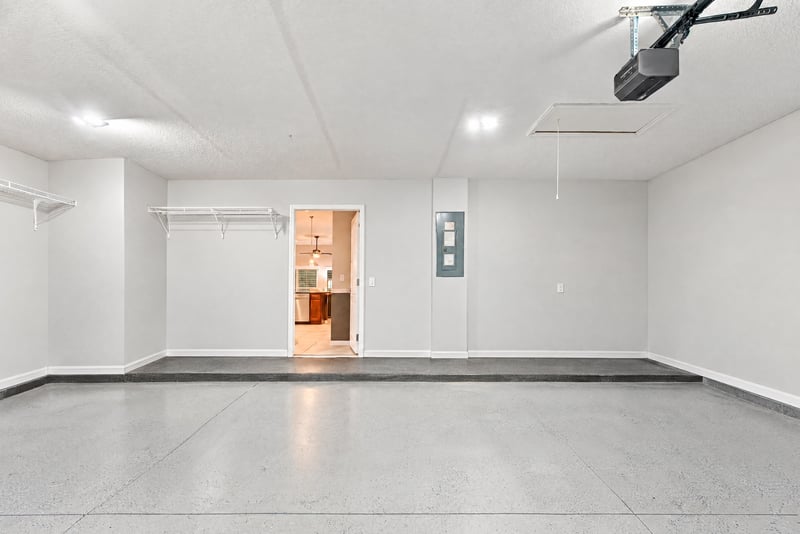 Garage with epoxy floor at 10923 Black Diamond Ct, Jacksonville, FL