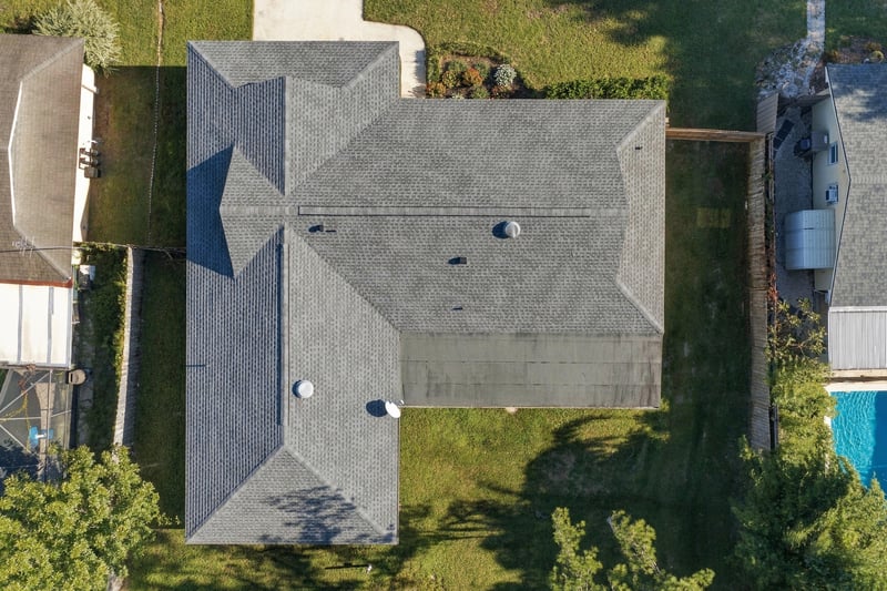 Drone aerial view of the roofline and backyard, photographed by Megapixeler on Crosby Ln, Orange Park