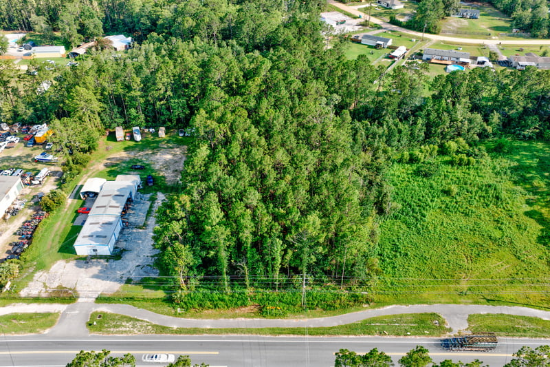 Aerial of wooded land near storage units along Co Rd 218 at 4393 Co Rd 218, Middleburg, FL 32068