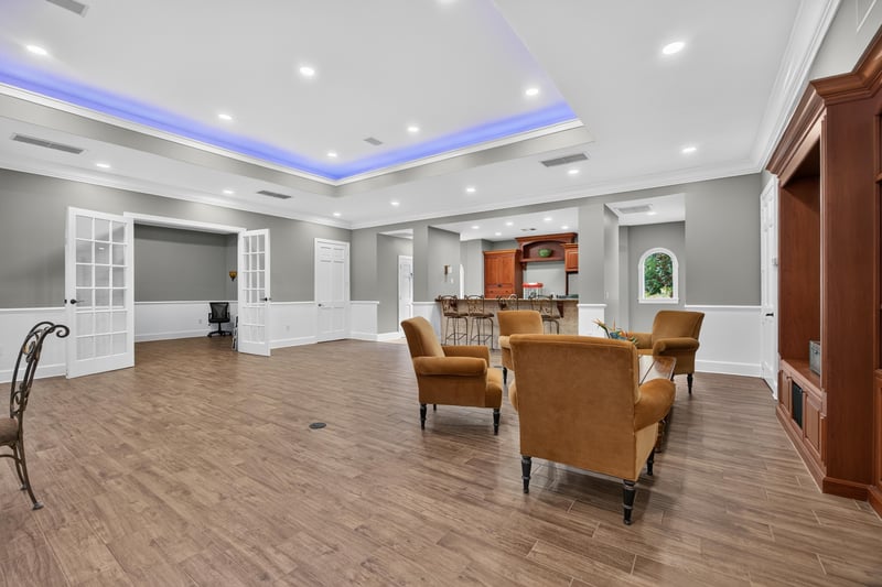 Clubhouse seating area with tray ceiling in Mirabella Condo