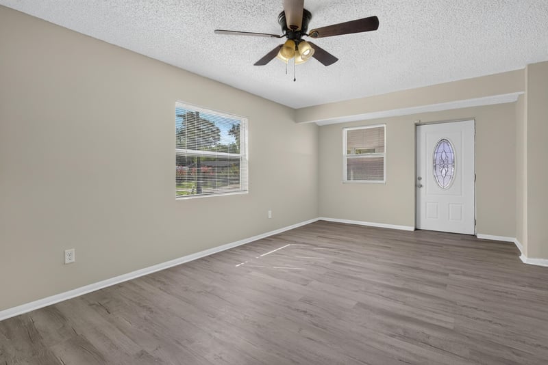 Room with window, ceiling fan and interior door at 5503 Boeing Dr, Jacksonville, FL 32207