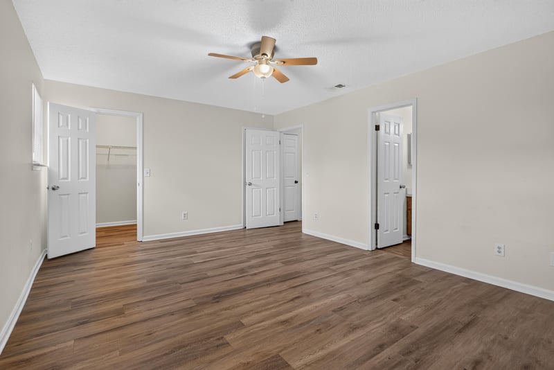 Empty room with wood floors at 4427 Millstone Ct, Jacksonville, FL