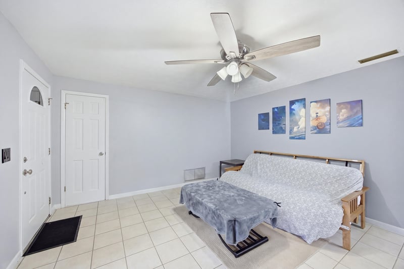 Living room near front door with tile floor at 417 Capricorn Ln, Orange Park, FL 32073
