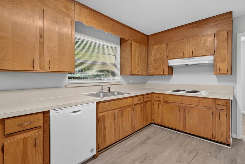 Kitchen with window, cabinets and dishwasher at 5503 Boeing Dr, Jacksonville, FL 32207