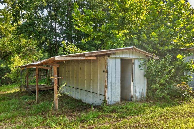 Open-sided shed on the property at 55520 Jewel-Thomas Rd, Callahan, FL 32011