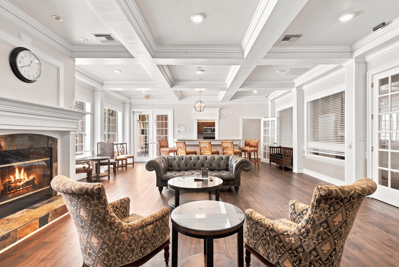 Clubhouse dining area with fireplace in Reserve at Point Meadows