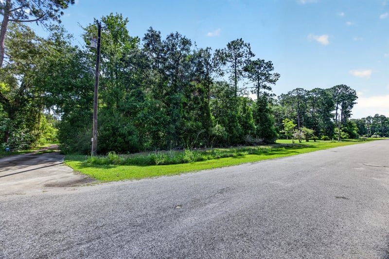 Low aerial view of the road intersection near the lot at 110 River Shores Rd, Palatka, FL 32043