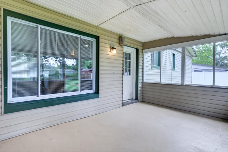 Screened sunroom with windows at 2618 Arlex Dr E, Jacksonville, FL