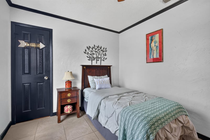 Bedroom with twin bed at 6931 Cane Grass Ln E, Jacksonville, FL 32244