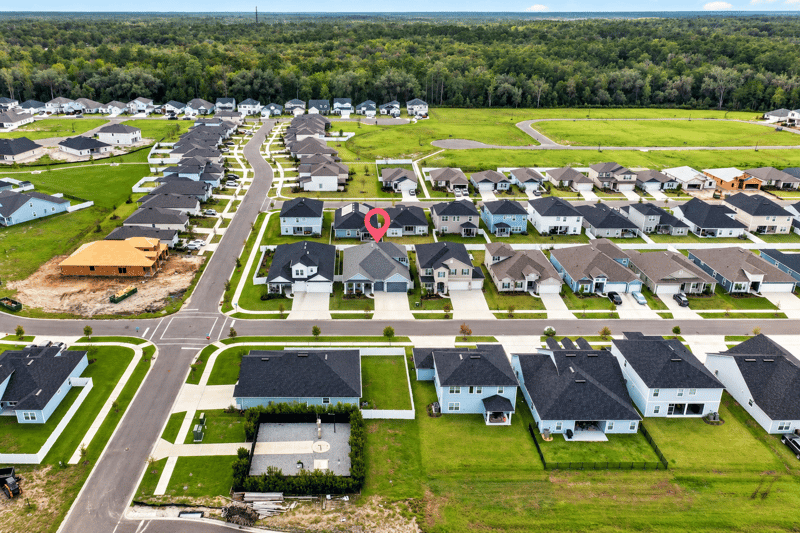 Aerial view of the street and surrounding homes in Middleburg, FL