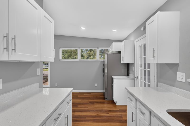 Kitchen with pass-through window at 1928 Montmarte Dr, Jacksonville, FL 32210