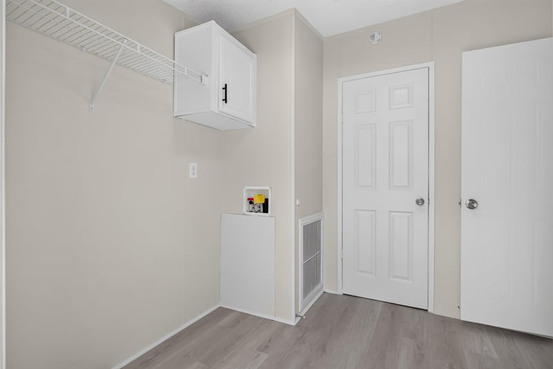 Laundry closet and hallway doors at 7603 Coach Park Dr, Jacksonville, FL 32244