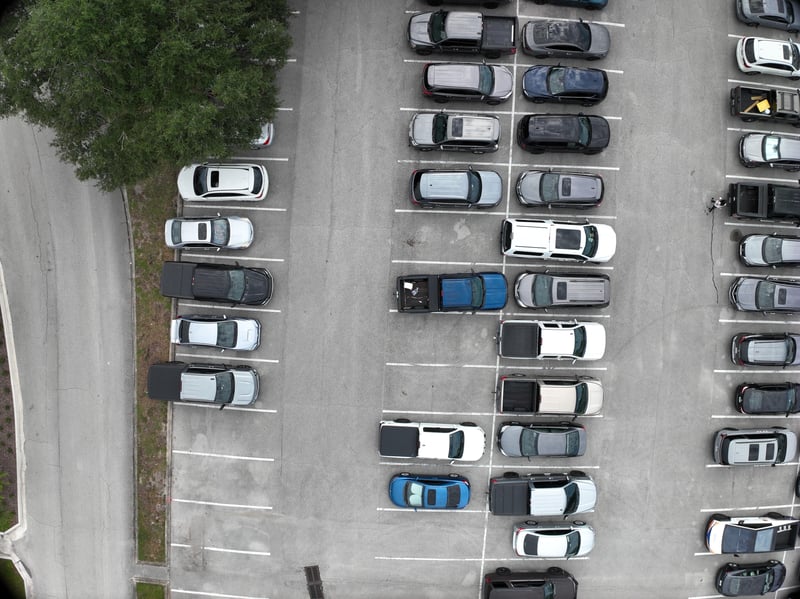 Aerial view of parking rows and tree canopy at 9406 Atlantic Blvd, Jacksonville, FL 32225