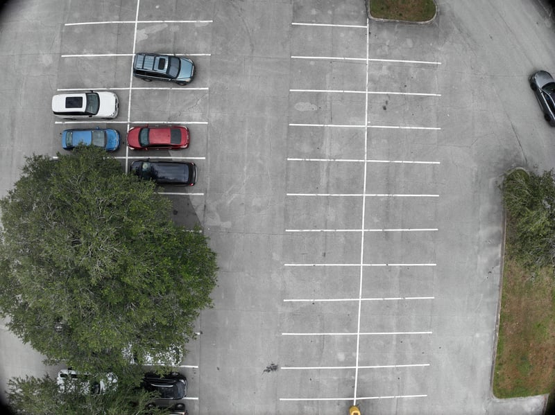 Aerial view of parking lot and landscaped strip at 9406 Atlantic Blvd, Jacksonville, FL 32225