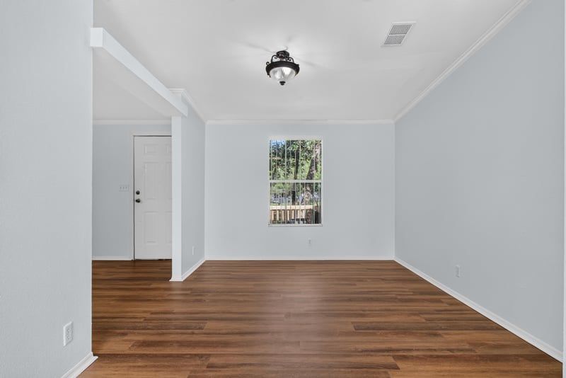 Open dining space with window view at 3215 Robin Ln, Middleburg, FL