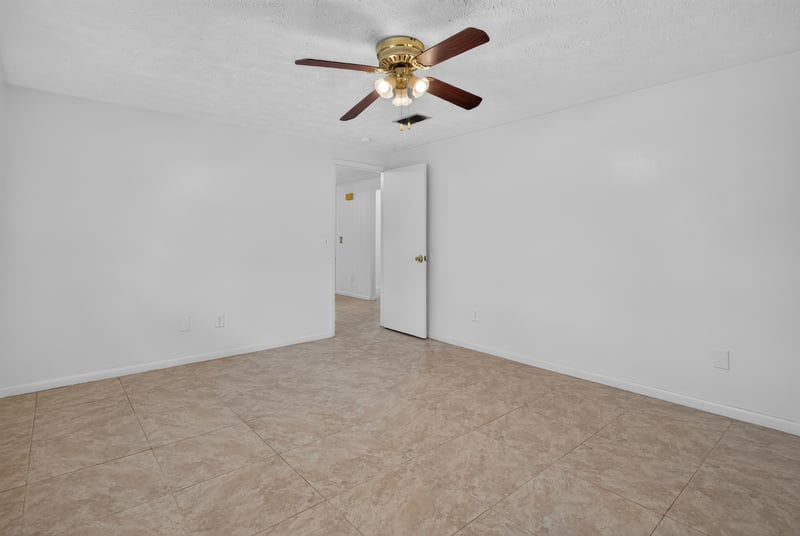 Bedroom with ceiling fan at 9954 Larkdale Ct, Jacksonville, FL 32257