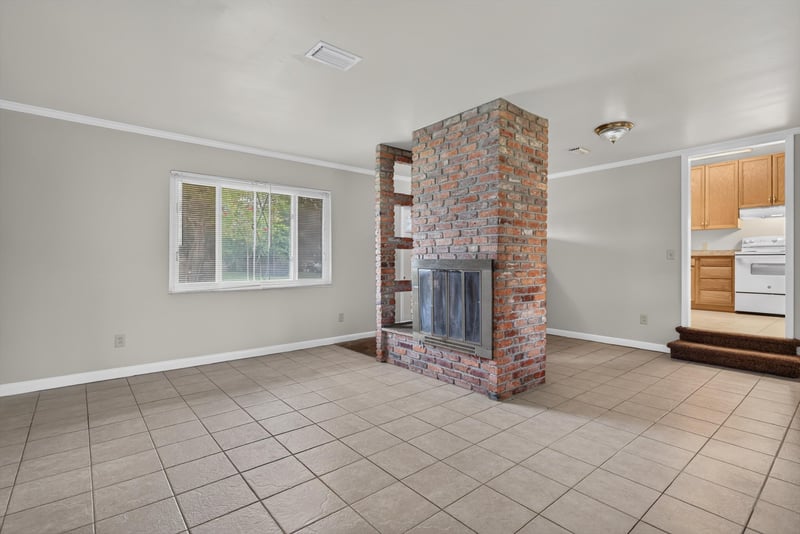 Living room brick column and kitchen pass-through at 2618 Arlex Dr E, Jacksonville, FL